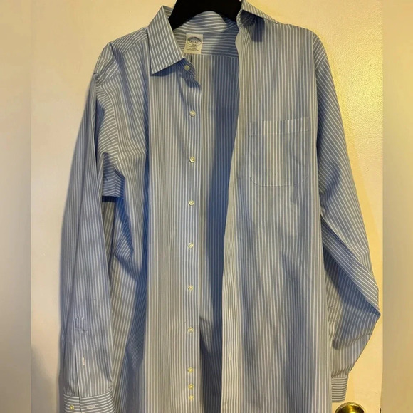 The Classic Blue and White Striped Button-Up Shirt: A Timeless Elegance - Picture 1 of 3